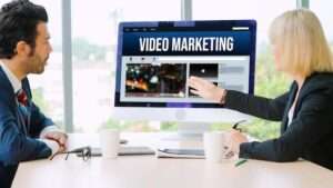 Business professionals discussing video marketing strategy