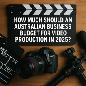 Flat lay of professional video production gear and clapperboard with text overlay reading "How Much Should a Business Budget for Video Production in 2025?", ideal visual for businesses planning video marketing budgets.