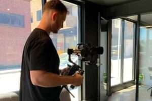 Corporate video production Brisbane behind-the-scenes filming with stabilised camera